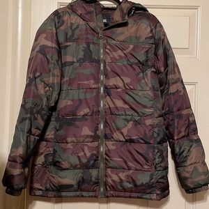 VANS camo puffer jacket with orange lining.